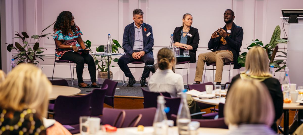 Nigel Twumasi speaking at a corporate or professional event